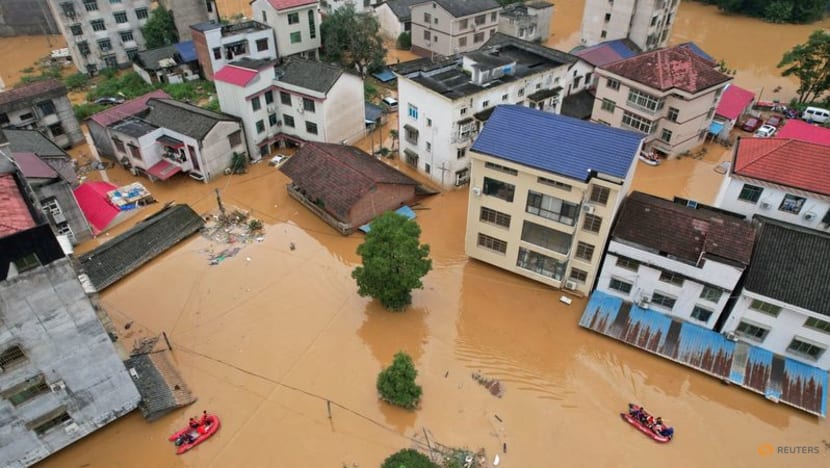 China braces for twin tropical cyclones after deadly flash floods